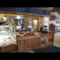 Wraparound Bar, Retail Counter and Bakery Display Cases, in Quarter-sawn, Fumed Oak, Lazy Lion Restaurant